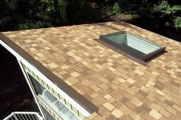 Skylight and Composite shingle roofing project from Larry Haight Residential Roofing
