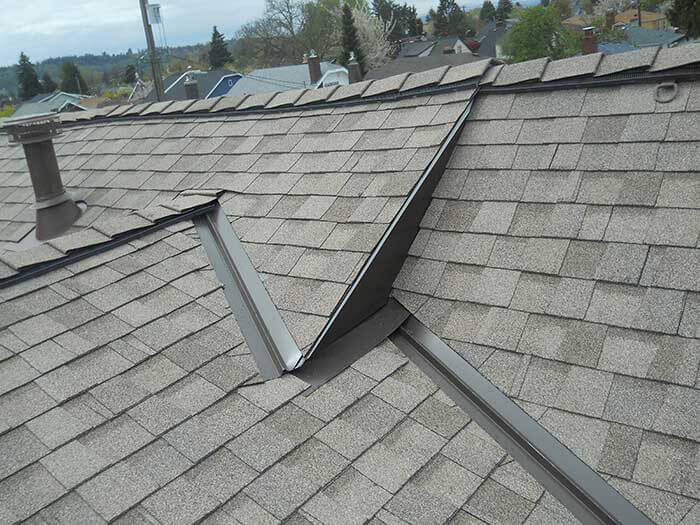 Composite roofing shingles