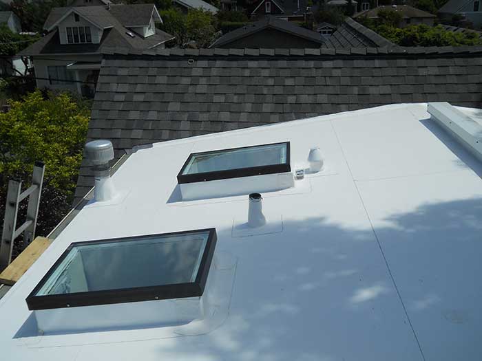 Skylights and PVC membrane roof from Larry Haight Residential Roofing