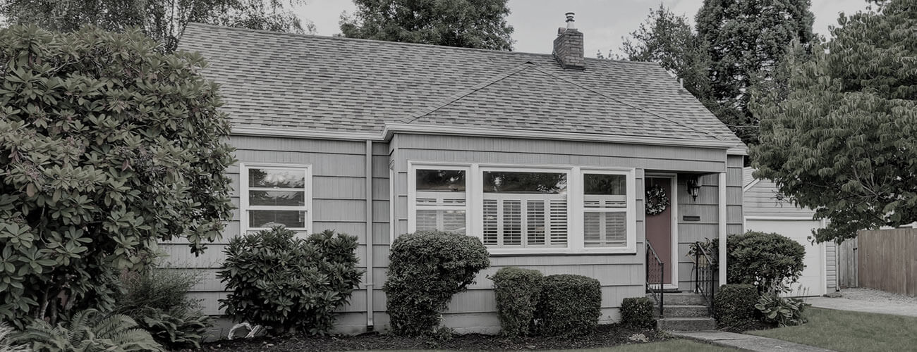 Home in Burien, WA, after asphalt shingle replacement for roof.