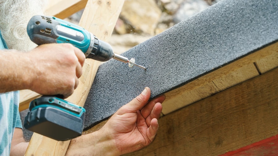 Screwing on felt roofing