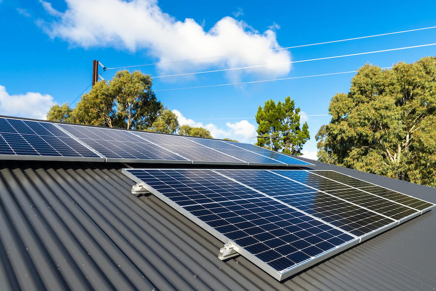 Solar panels mounted on a standing seam metal roof