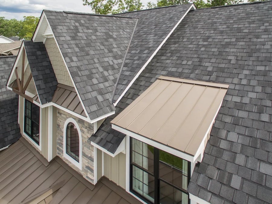 Finished composite shingle roof with dimensional texture and curb appeal